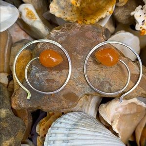 Sterling handmade spiral hoop earrings with carnelian bead detail